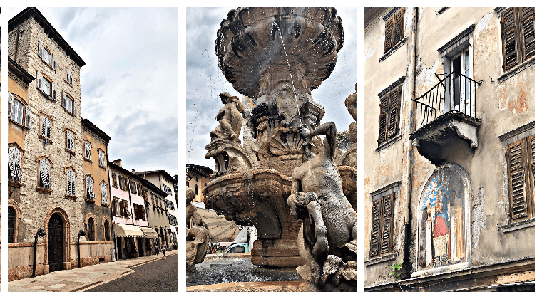 Die Innenstadt von Trient mit seinen alten Häuserfassaden und dem bekannten Neptunbrunnen